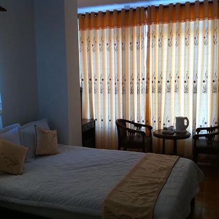 Minh Quan Hotel Bao Loc Habitación foto