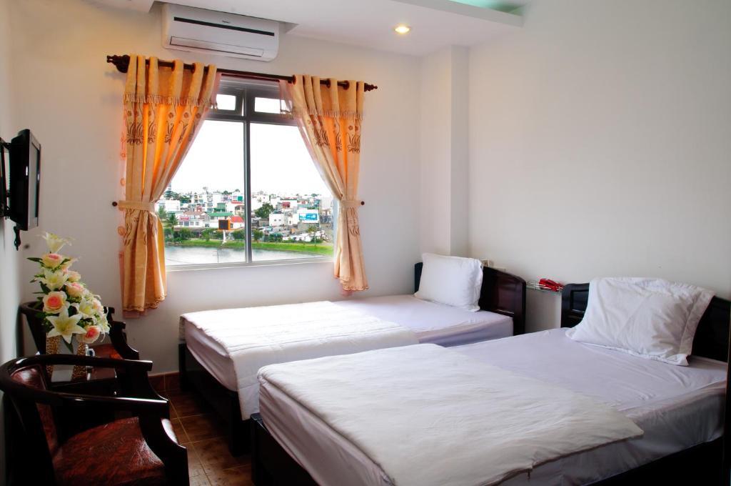 Minh Quan Hotel Bao Loc Habitación foto