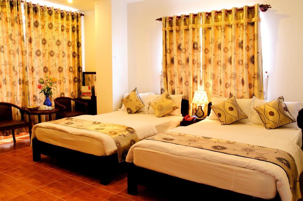 Minh Quan Hotel Bao Loc Habitación foto